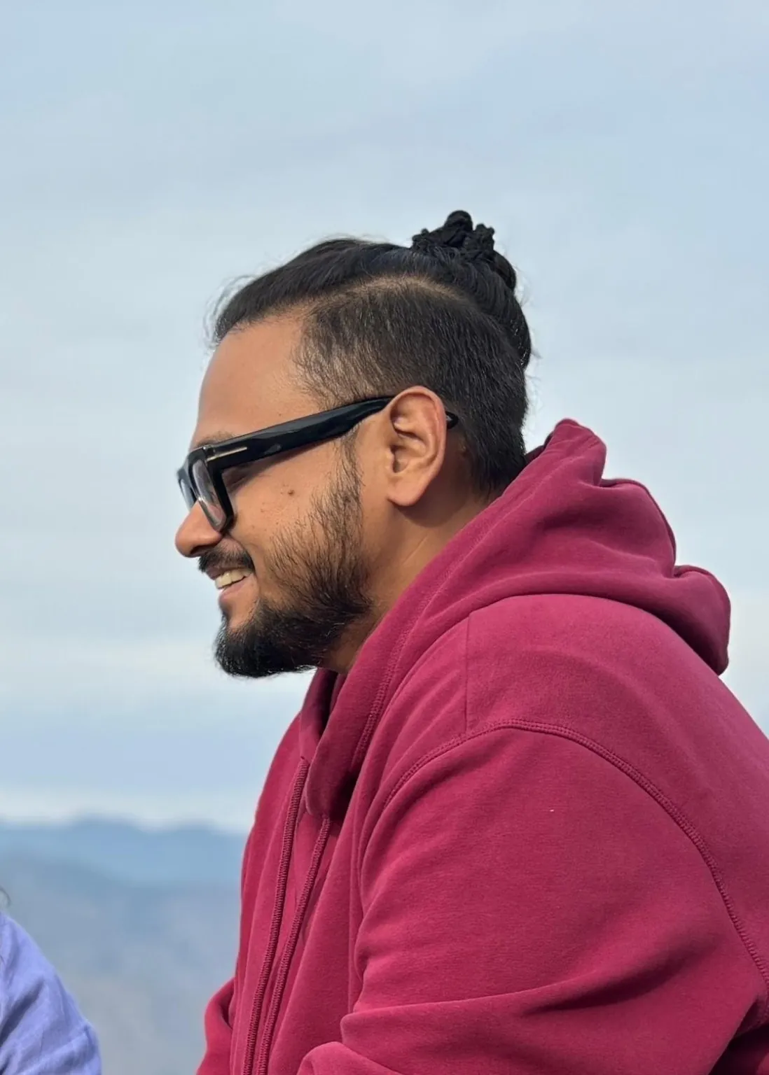 Shubho Gupta portrait against an open sky